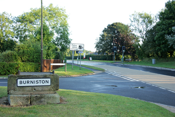 The Cinder Track meets the A165 at Burniston