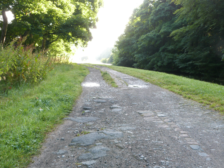 Badly surfaced towpath on Leeds & Liverpool canal